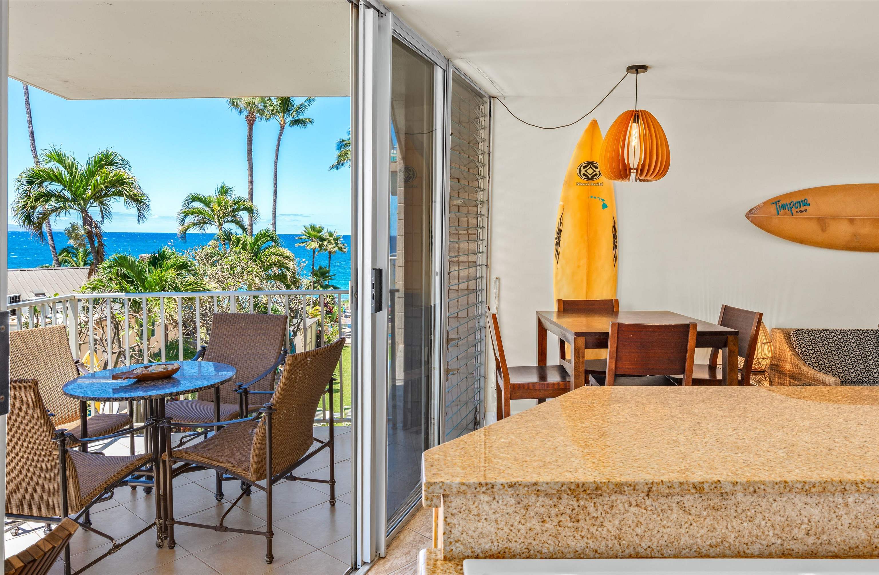 2450 South Kihei Road, Unit 301 Kihei, HI 96753 - Photo 10 of 35 a bedroom with a bed and a table