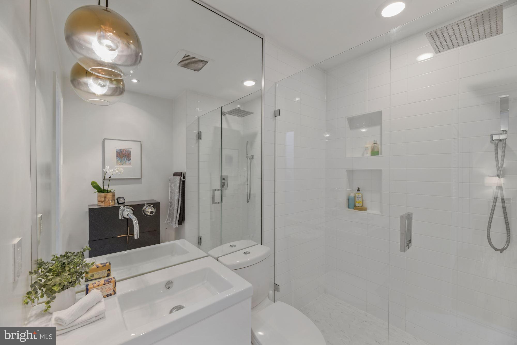 1822 T Street Northwest, Unit 3 Washington, DC 20009 - Photo 12 of 22 Modern Bath w/ Marble Finishes & Designer Fixtures
