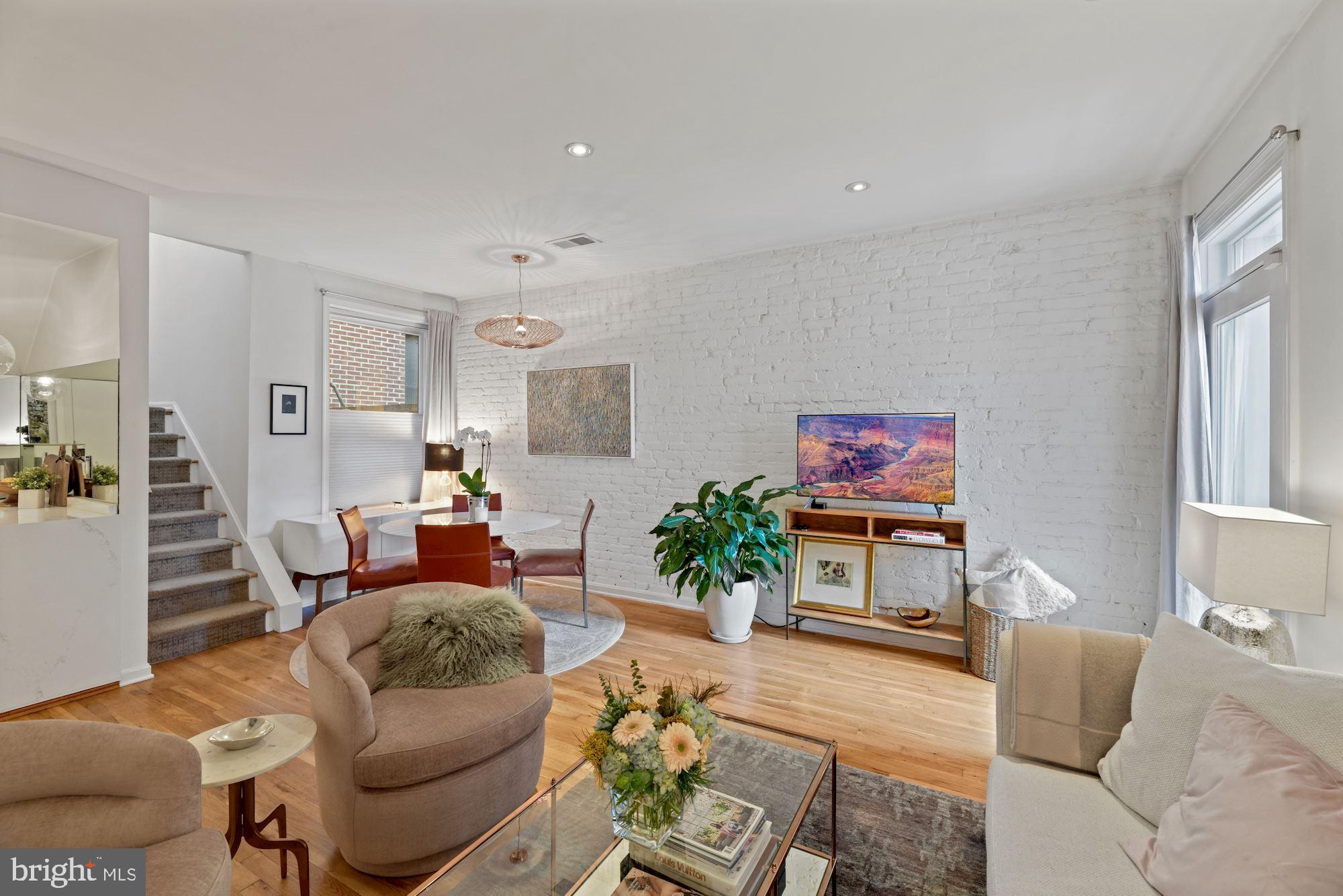 1822 T Street Northwest, Unit 3 Washington, DC 20009 - Photo 3 of 22 Open Layout for Liv & Din Rm w/ Exposed Brick Wall