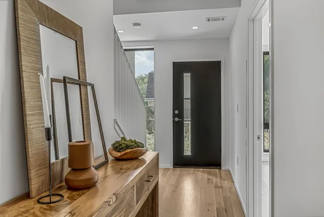 a view of a hallway with workspace