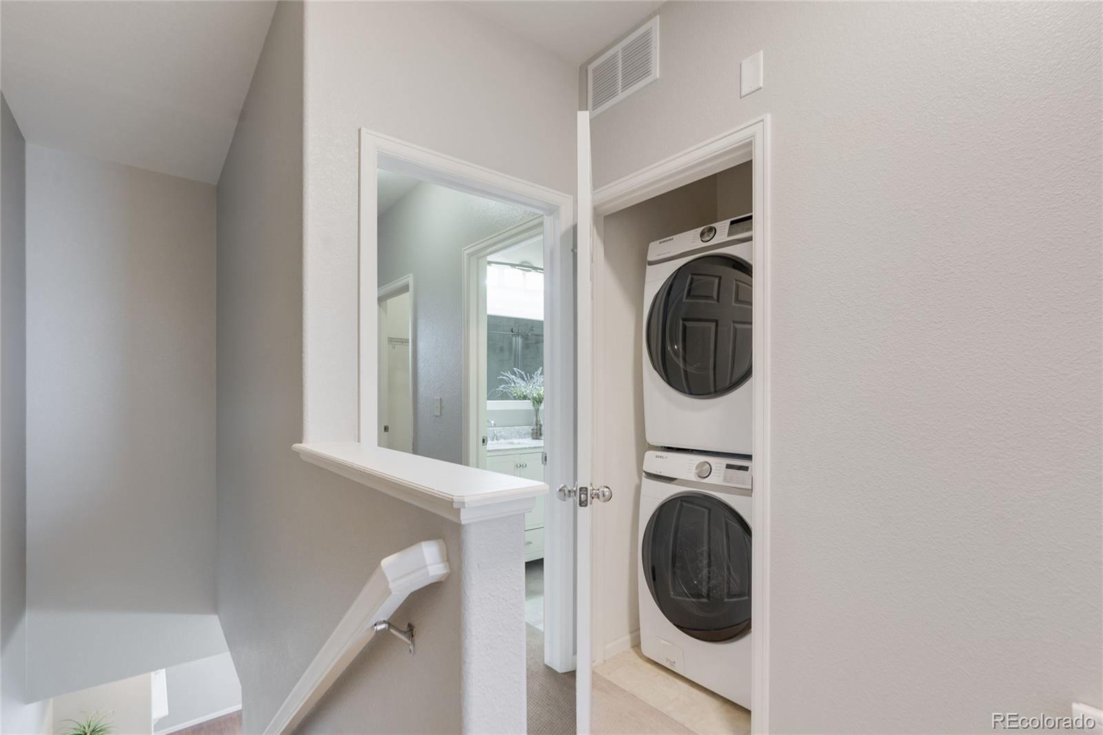 5392 Allison Street Arvada, CO 80002 - Photo 15 of 47 a utility room with dryer and washer