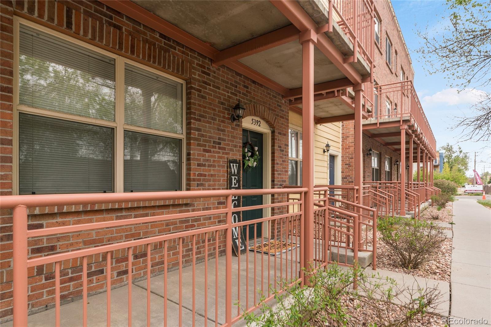 5392 Allison Street Arvada, CO 80002 - Photo 27 of 47 a view of a house with a window