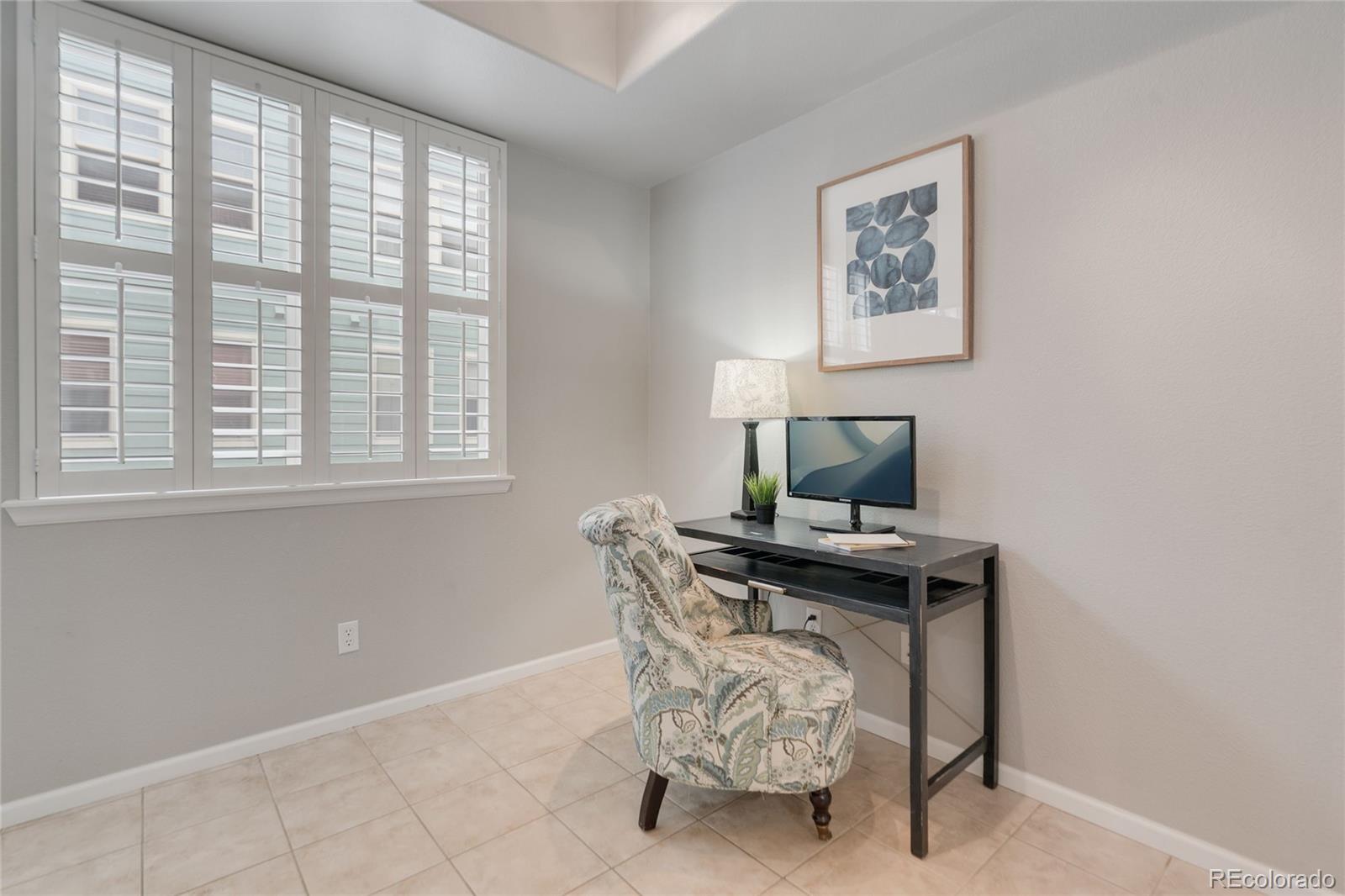 5392 Allison Street Arvada, CO 80002 - Photo 7 of 47 a living room with furniture and a window