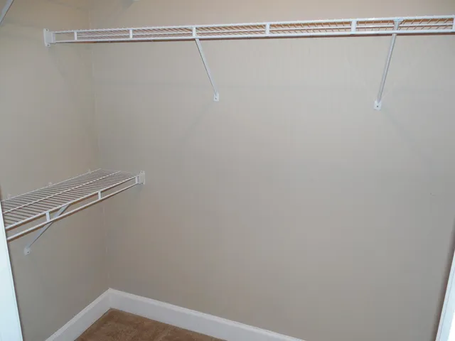 a view of a room with racks on the wall