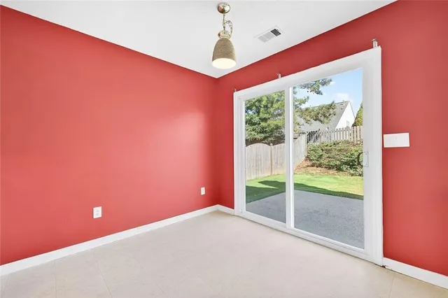 a view of a room with a large window