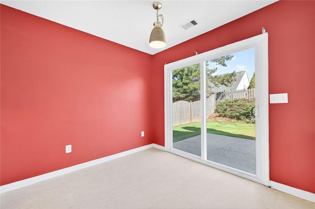 4010 Ridgefair Drive Cumming, GA 30040 - Photo 11 of 28 a view of a room with a large window