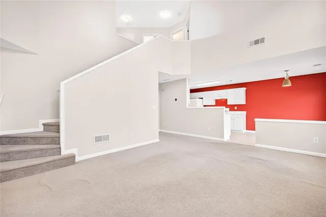 an entryway with an empty room