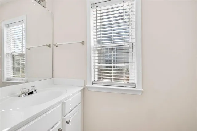 a bathroom with a sink and a bathtub