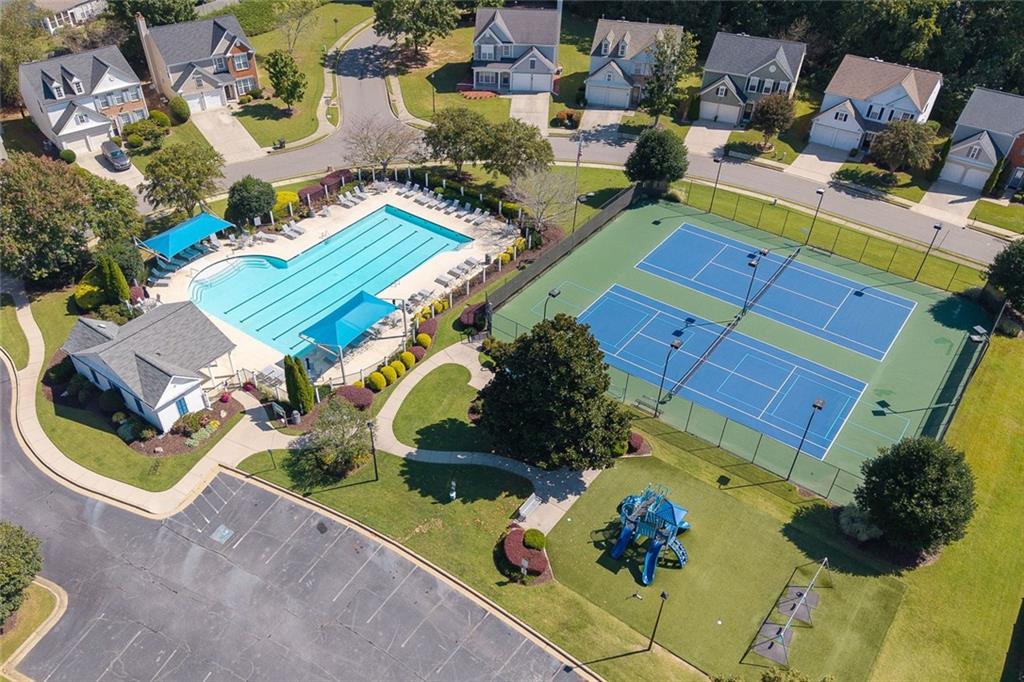 4010 Ridgefair Drive Cumming, GA 30040 - Photo 28 of 28 an aerial view of a house with a swimming pool