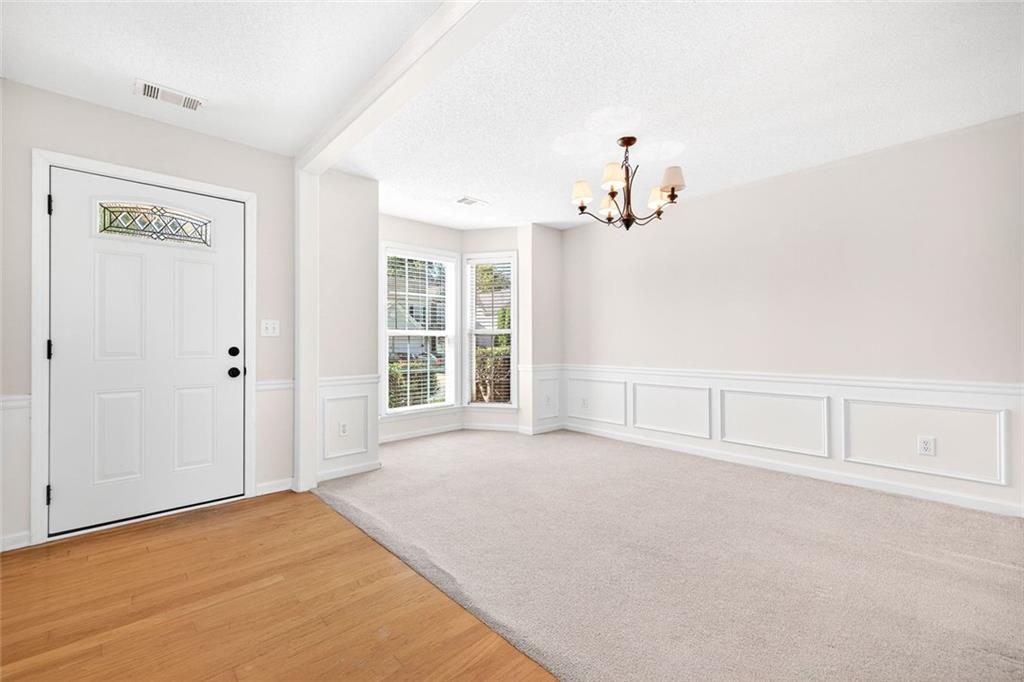 4010 Ridgefair Drive Cumming, GA 30040 - Photo 4 of 28 a view of an empty room with a window