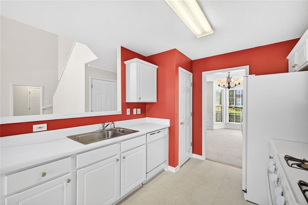 4010 Ridgefair Drive Cumming, GA 30040 - Photo 8 of 28 a bathroom with a sink and a mirror