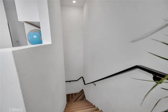 a view of an entryway with wooden floor