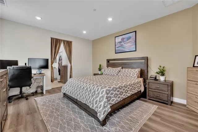 a bedroom with a bed and furniture