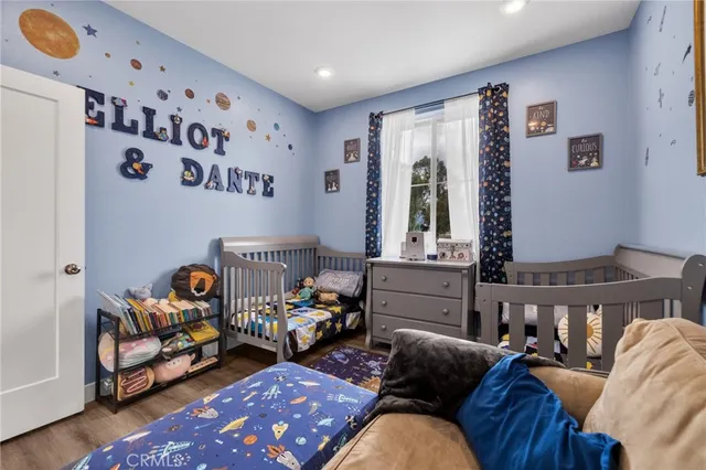 a living room with furniture chess board and a couch