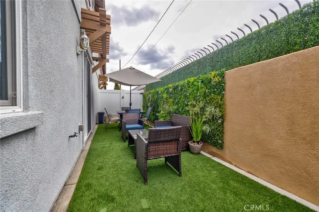 a garden view with a seating space