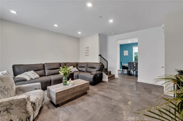 a living room with furniture and a couch