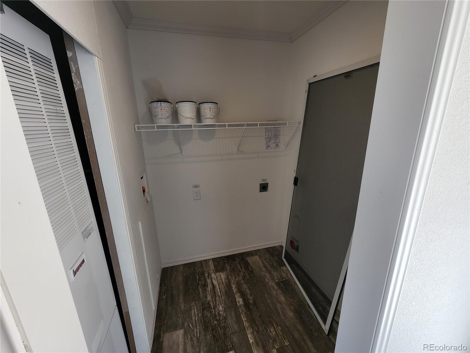207 Willow Street Rockvale, CO 81244 - Photo 9 of 19 a view of walk in closet with wooden floor