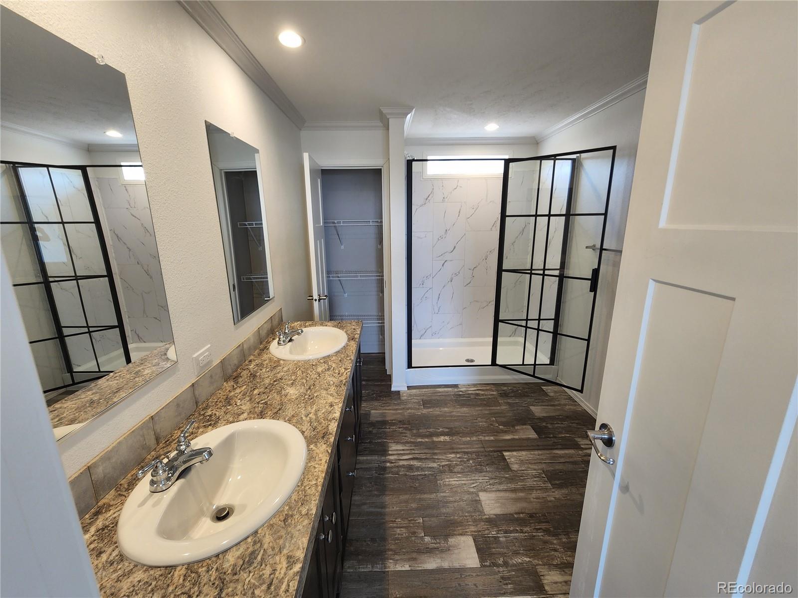 207 Willow Street Rockvale, CO 81244 - Photo 10 of 19 a bathroom with a sink and a mirror