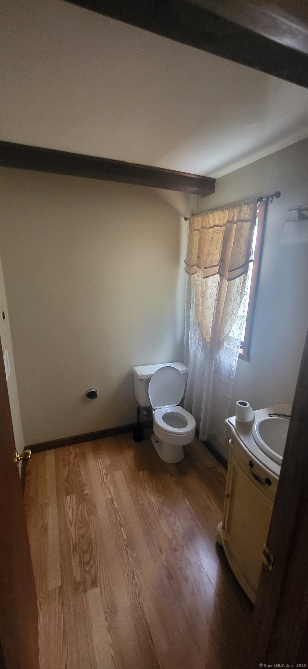179 High Street Sprague, CT 06330 - Photo 7 of 9 a view of a room with wooden floor and sink