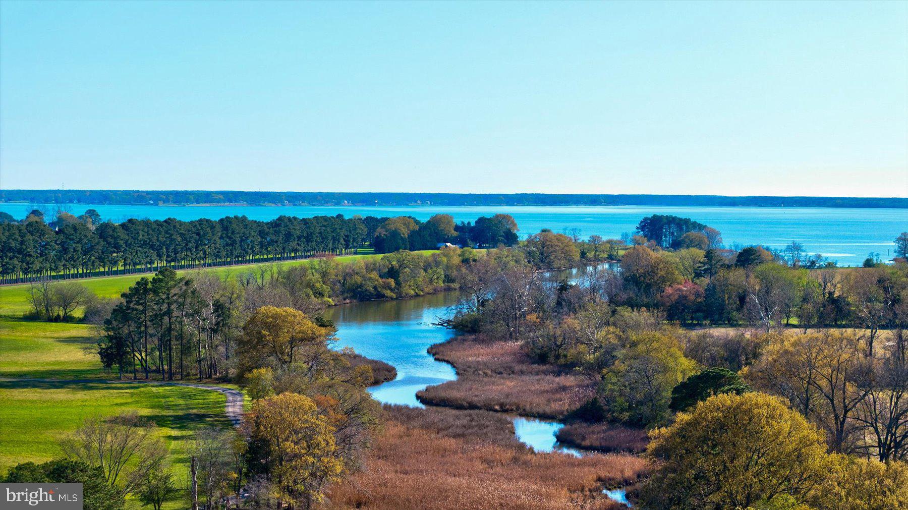 29031 Howell Point Road Trappe, MD 21673 - Photo 105 of 129 a view of a lake with houses with outdoor space