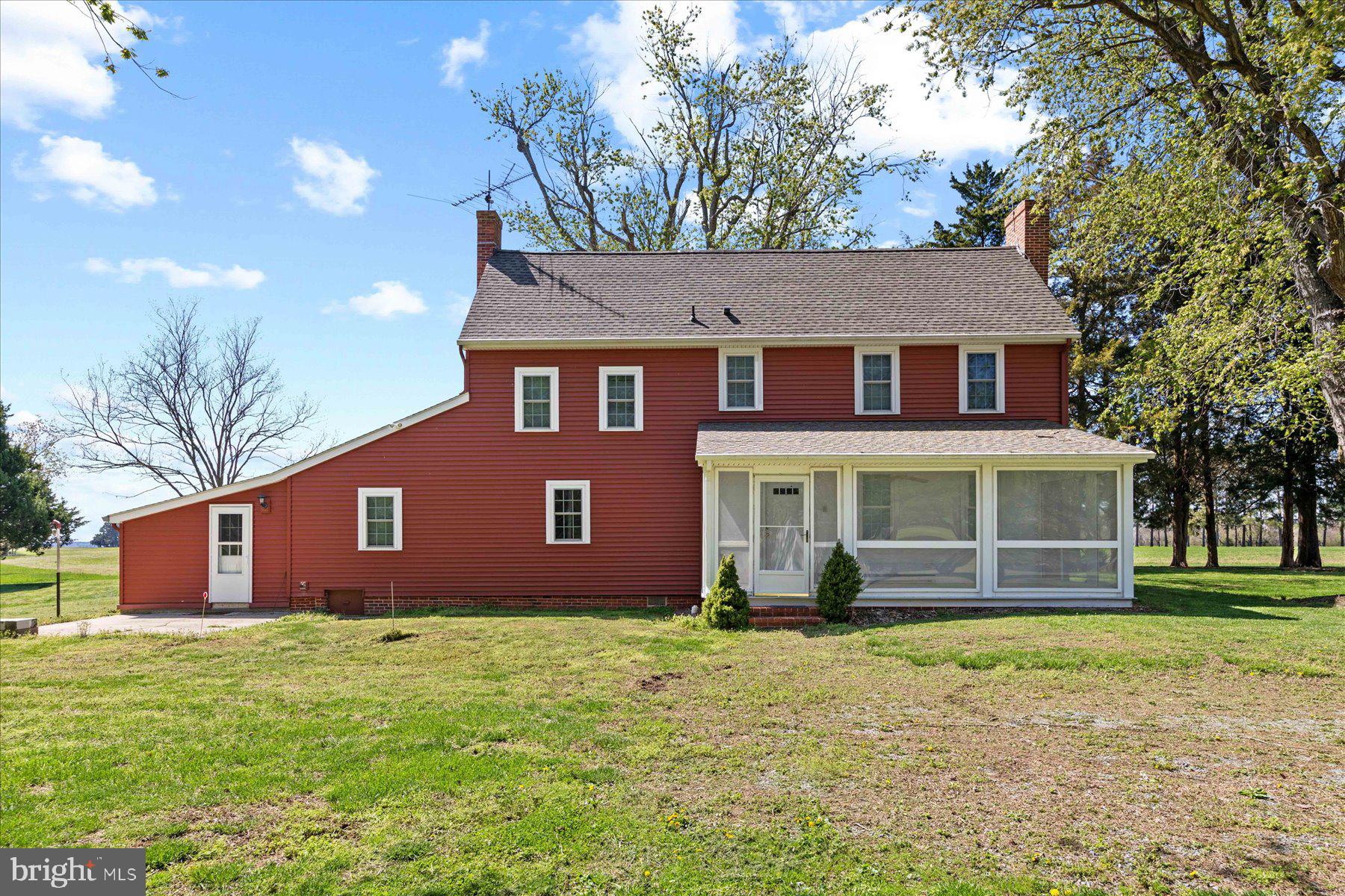 29031 Howell Point Road Trappe, MD 21673 - Photo 112 of 129 a front view of a house with a yard