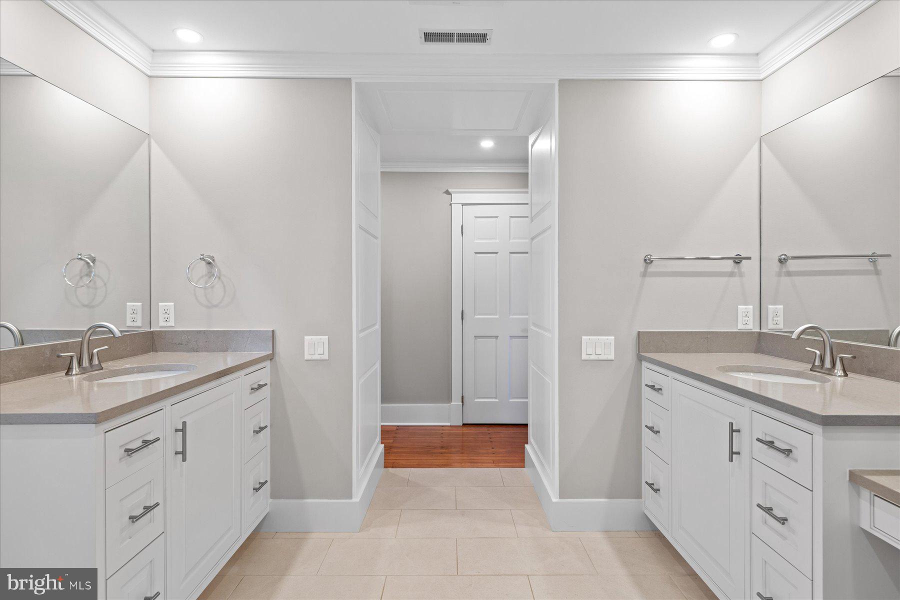 29031 Howell Point Road Trappe, MD 21673 - Photo 57 of 129 a spacious bathroom with a granite countertop sink mirror and double
