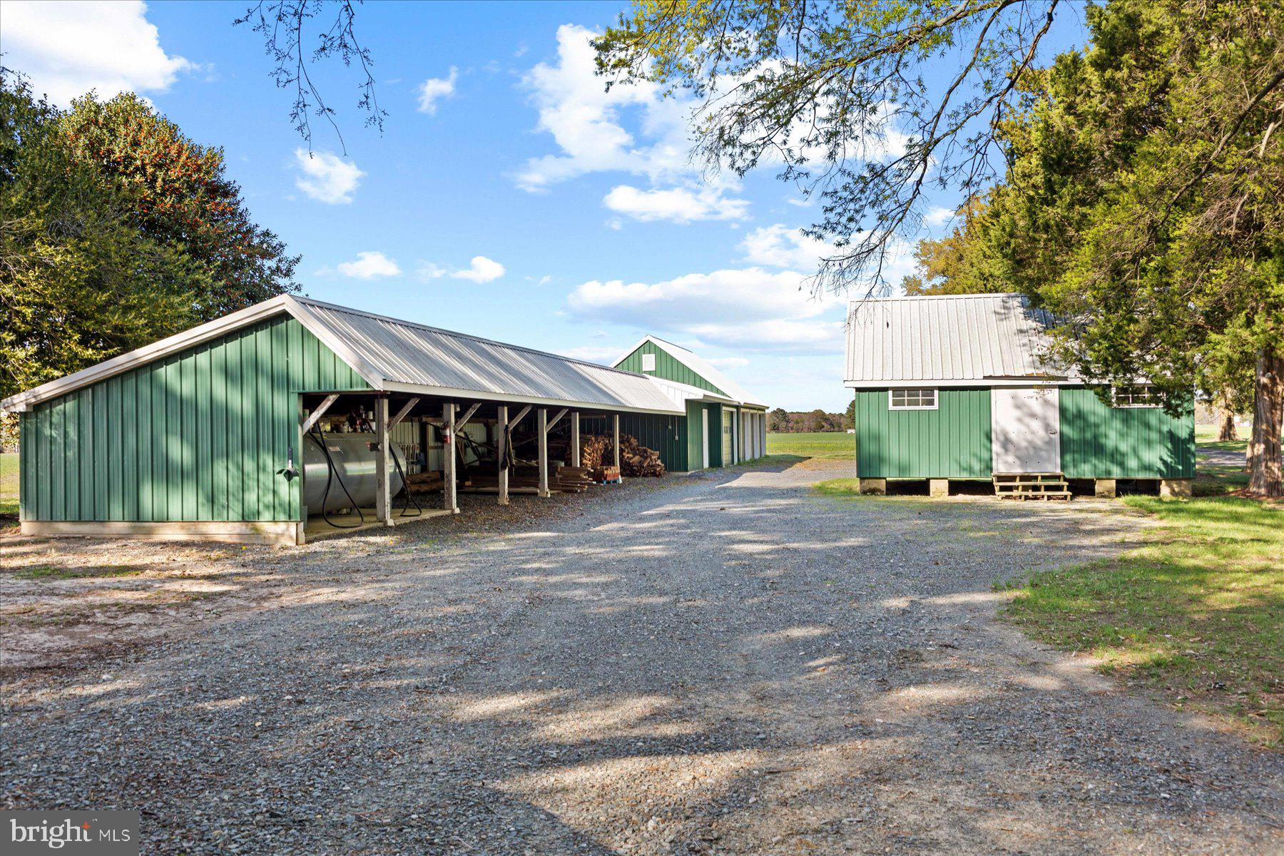 29031 Howell Point Road Trappe, MD 21673 - Photo 69 of 129 a view of a house with a yard and tree s