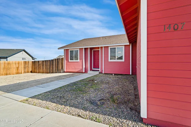 a view of a hallway with a chandelier