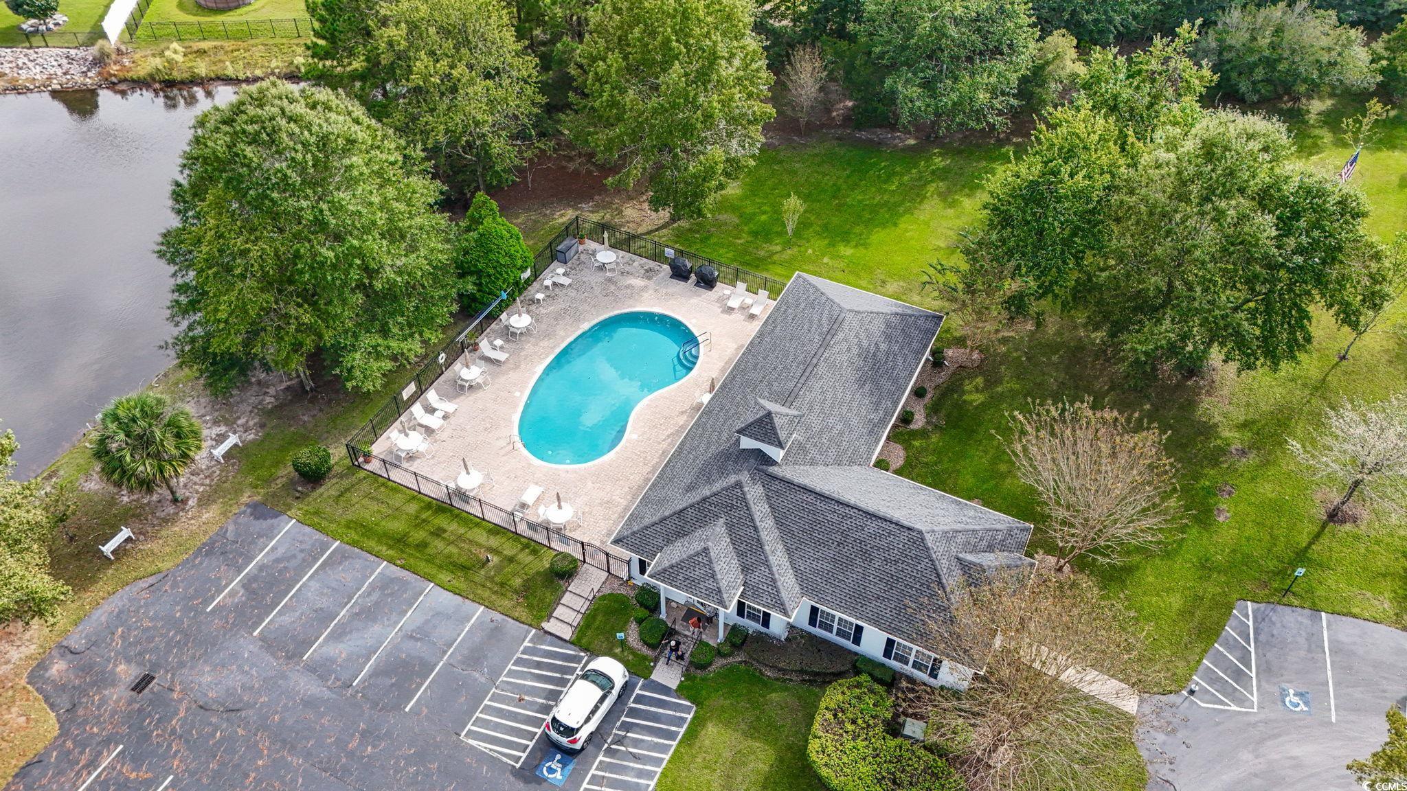 743 Helms Way Conway, SC 29526 - Photo 16 of 37 Aerial view of a nearby body of water and a pool area
