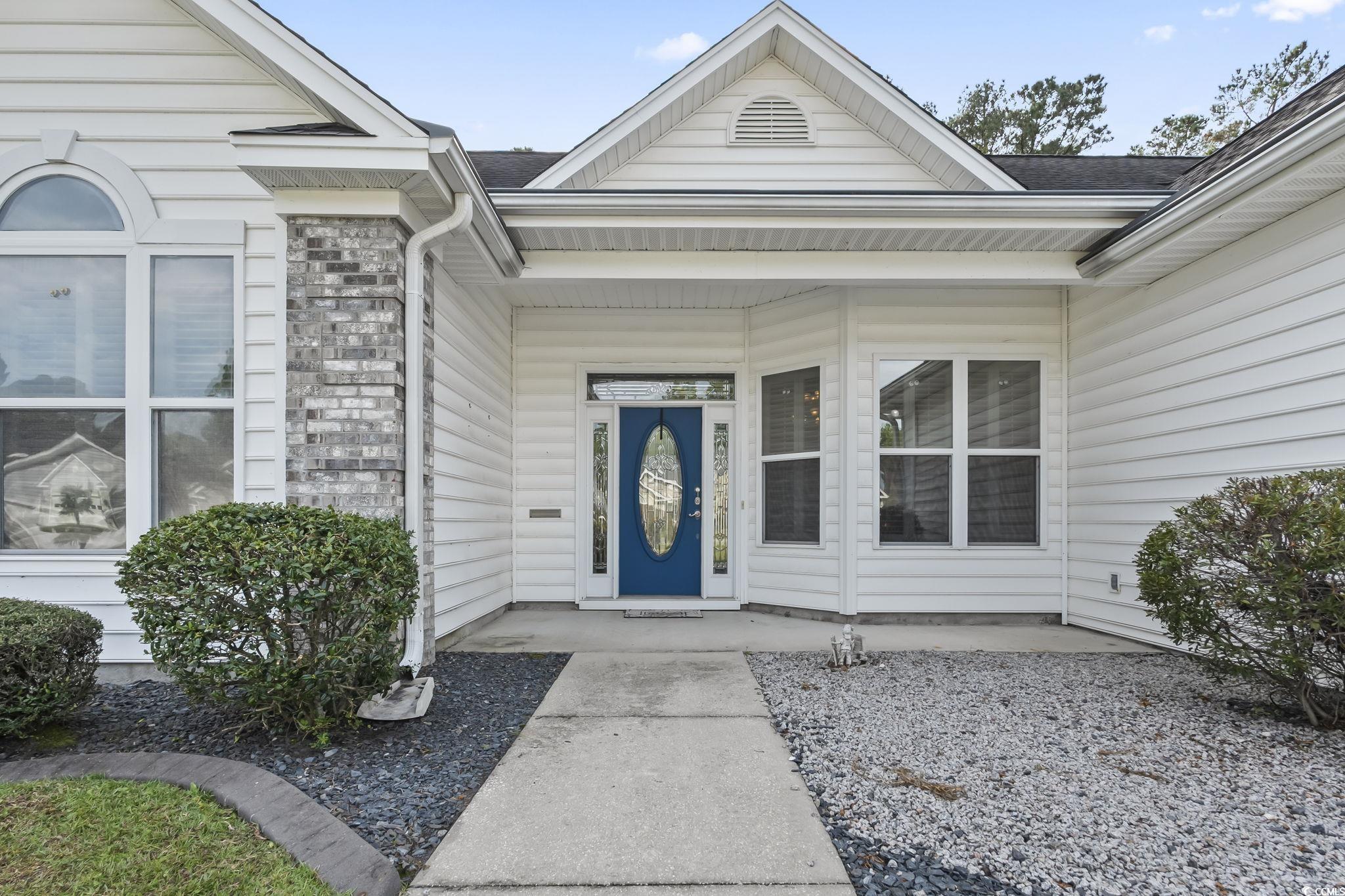 743 Helms Way Conway, SC 29526 - Photo 37 of 37 View of exterior entry with covered porch and stone siding