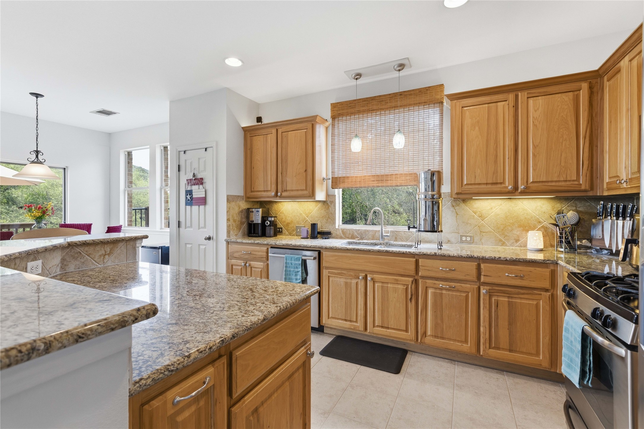 8122 Lime Creek Road Volente, TX 78641 - Photo 11 of 40 Stainless appliances and lots of light