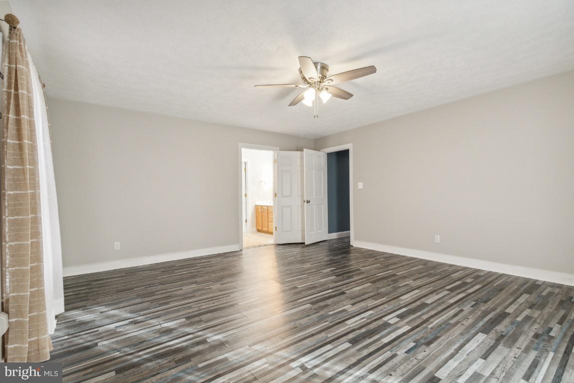 240 Sandy Ridge Road Fredericksburg, VA 22405 - Photo 24 of 43 Generously sized primary suite with lots of light