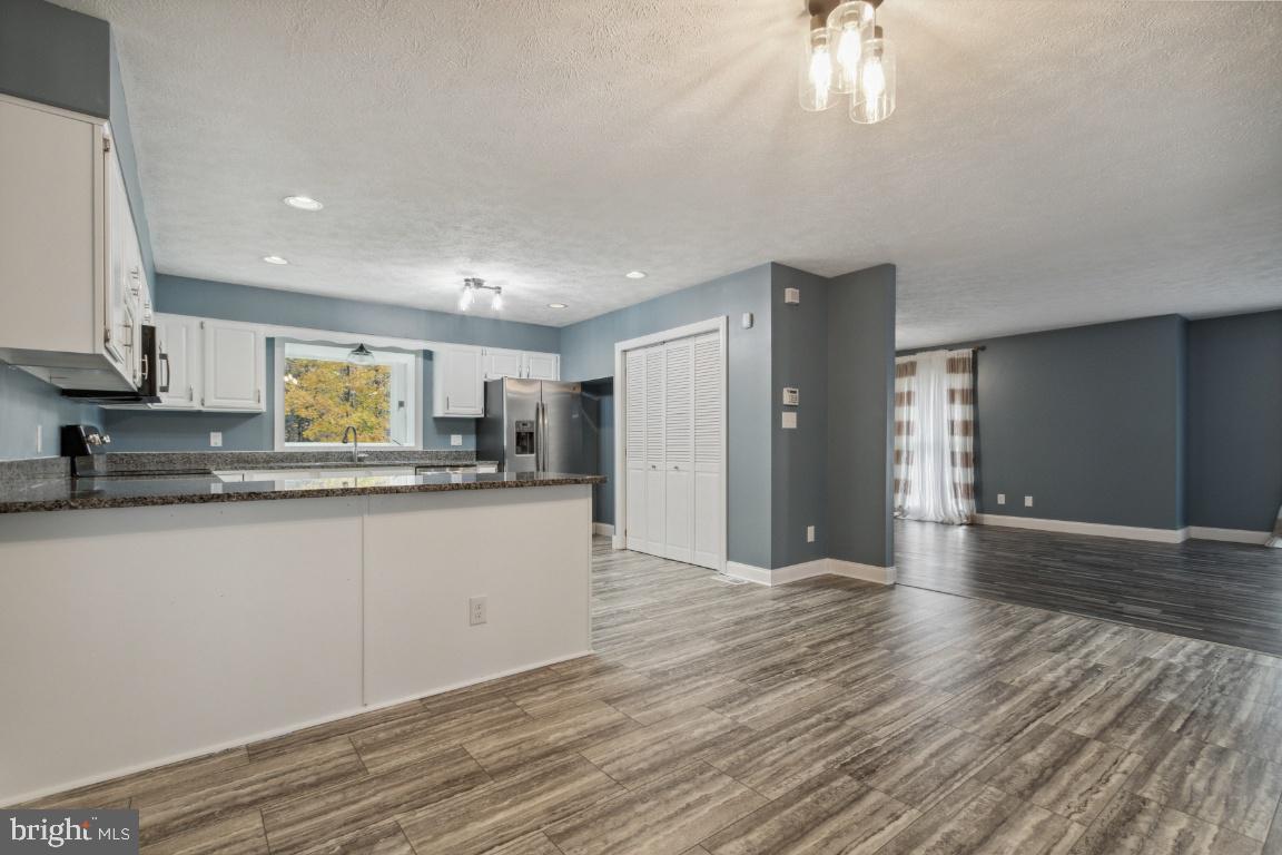 240 Sandy Ridge Road Fredericksburg, VA 22405 - Photo 8 of 43 Open concept into large family/dining area