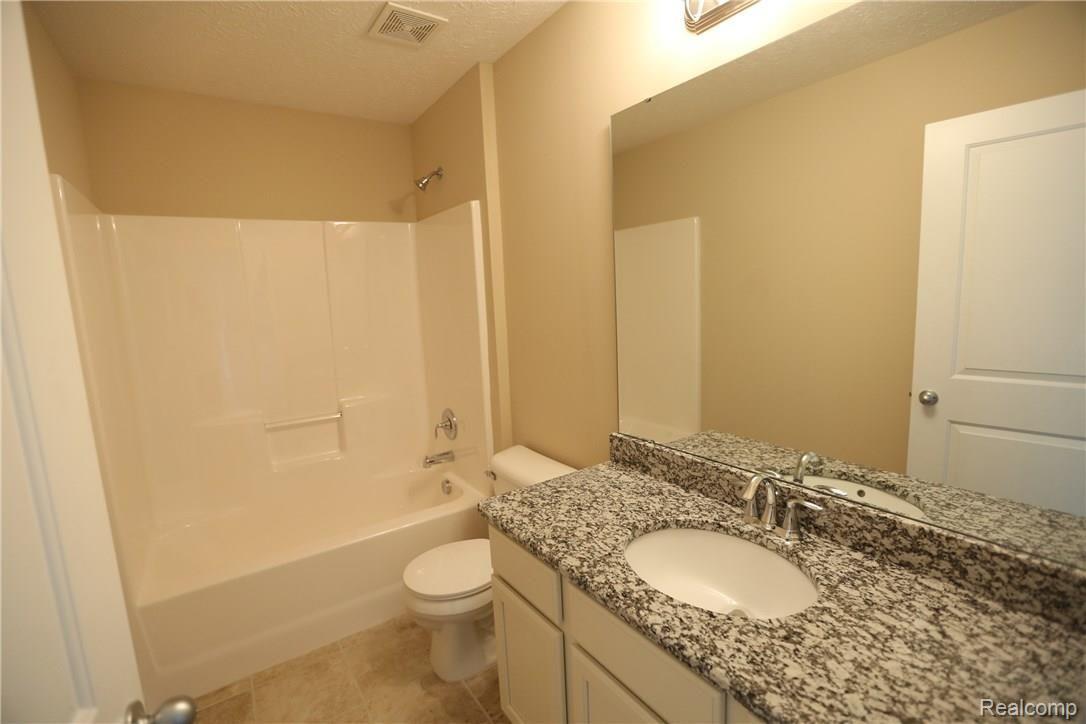 485 Hosta, Unit 86 Howell, MI 48843 - Photo 10 of 11 Please note, pictures are of a different condominium with identical floor plan!