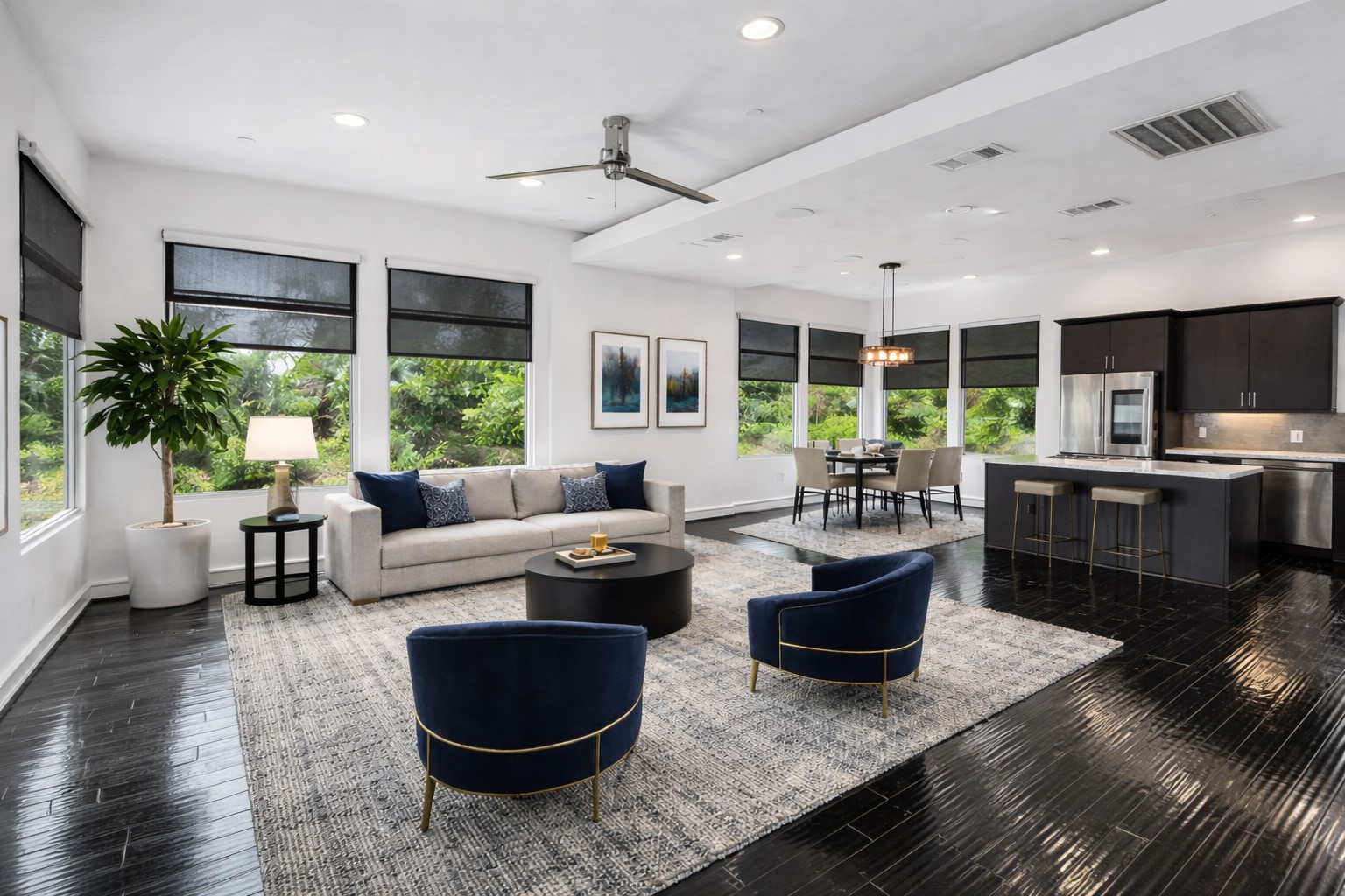 Virtually staged open-concept living area showcasing spacious layout and natural light.