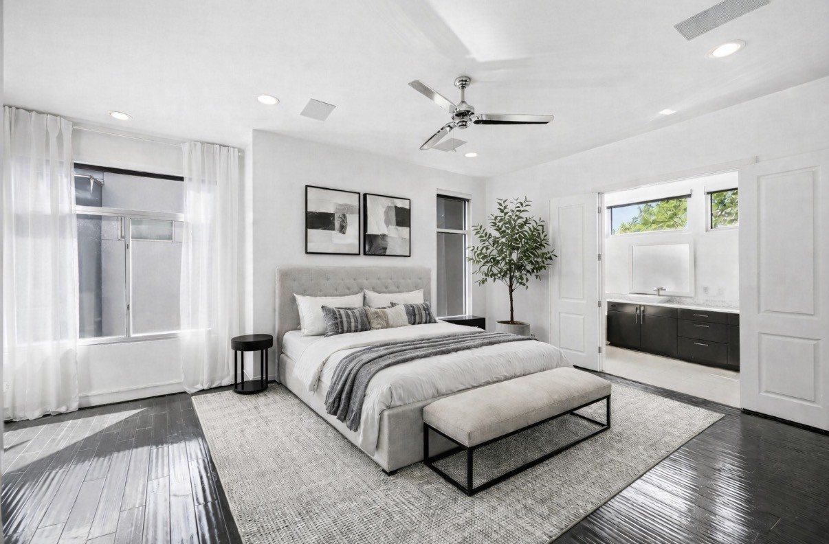 5228 Maxie Street, Unit A Houston, TX 77007 - Photo 3 of 28 Virtually staged primary bedroom with ample space, high ceilings, and natural lighting. A private staircase takes you to the spacious rooftop terrace.