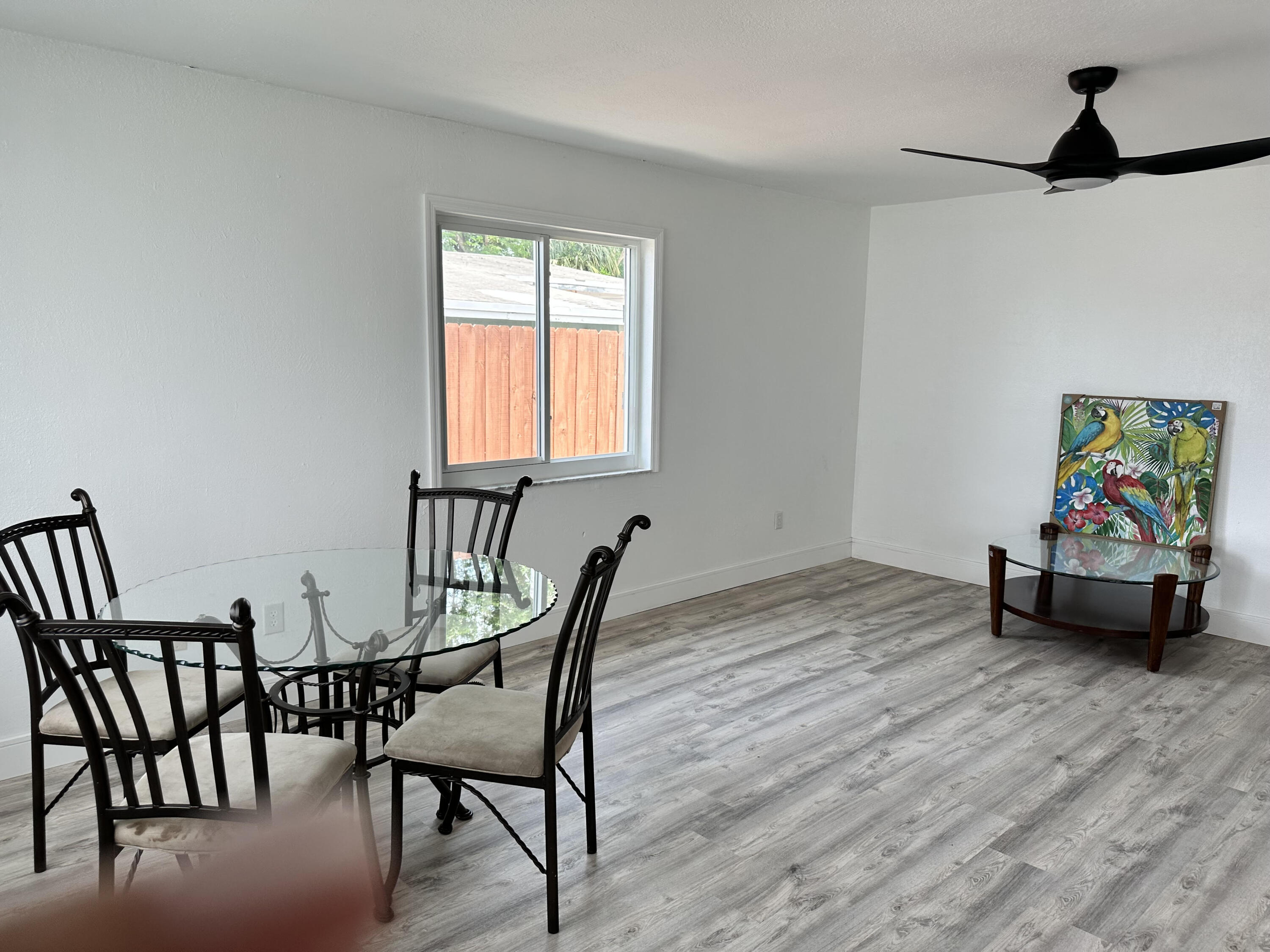 2814 Southeast Indian Street Stuart, FL 34997 - Photo 9 of 23 a living room with furniture and a window