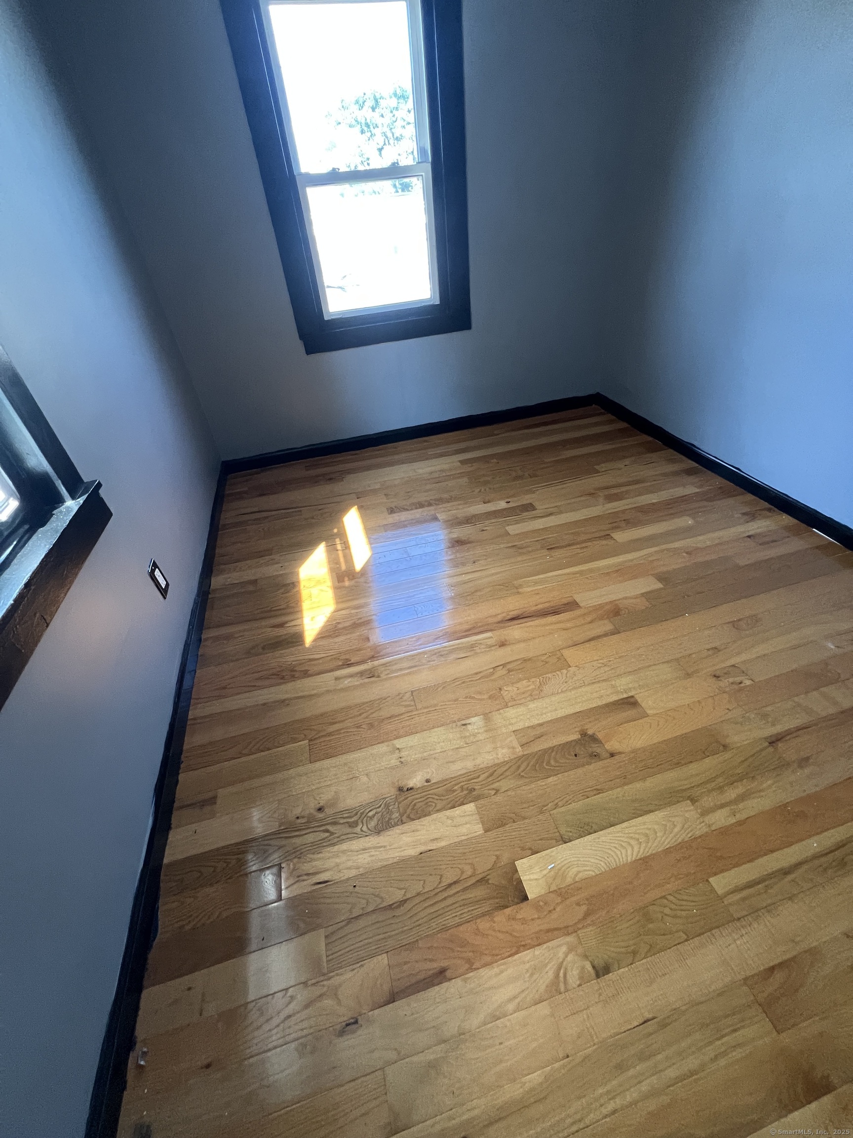 302 Dover Street Bridgeport, CT 06610 - Photo 10 of 15 a view of empty room with window