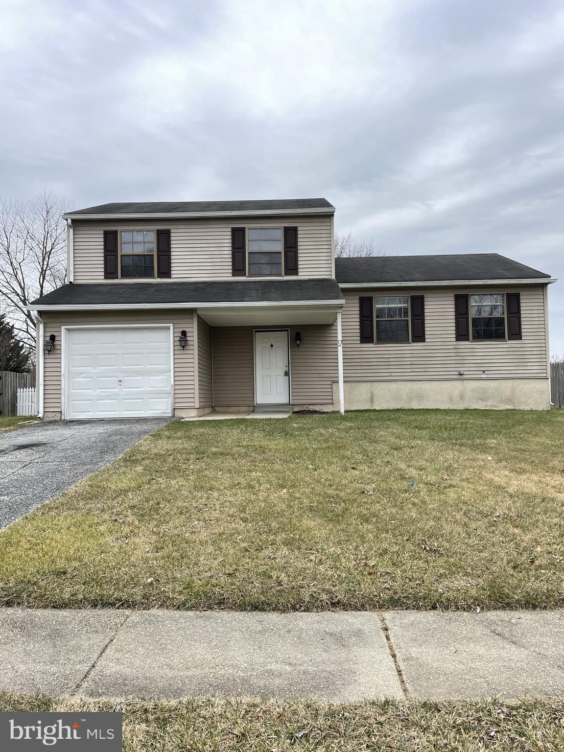 2 White Drive Newark, DE 19702 - Photo 1 of 29 a front view of a house with garden