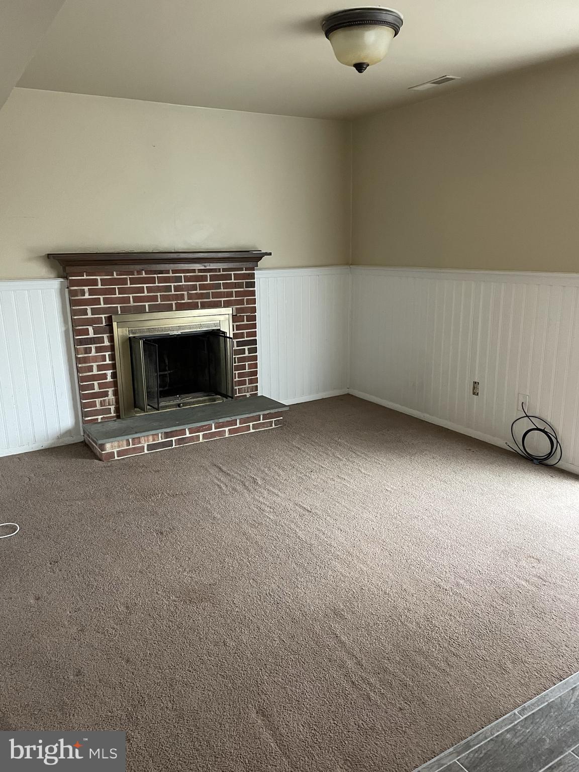 2 White Drive Newark, DE 19702 - Photo 6 of 29 a view of an empty room with a fireplace