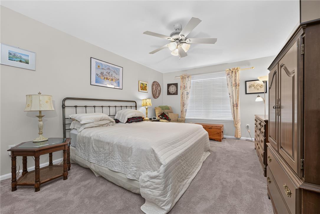 198 Park Ridge Drive Easton, PA 18040 - Photo 10 of 28 A restful retreat with plush carpeting and natural light filtering through the window, creating a serene atmosphere.