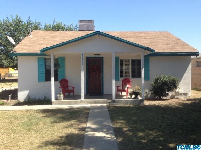26451 Harrison Road Visalia, CA 93277 - Photo 1 of 16 a view of a house with patio