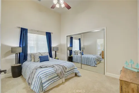 a bedroom with a bed and a table