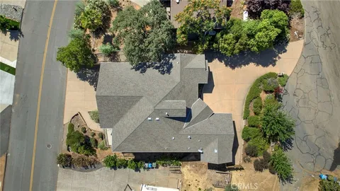 an aerial view of residential house and outdoor space
