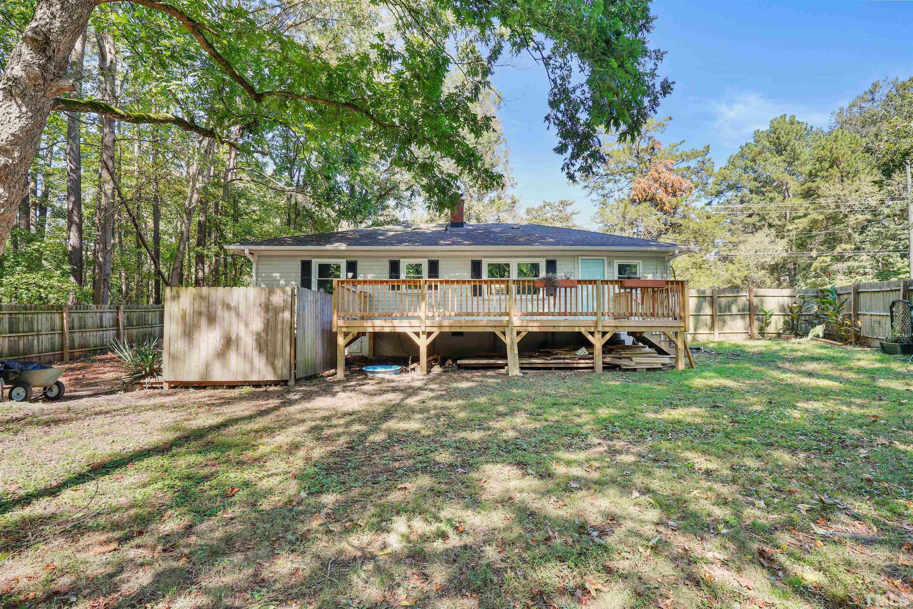 2706 Dearborn Drive Durham, NC 27704 - Photo 16 of 24 a view of a house with a yard and sitting area