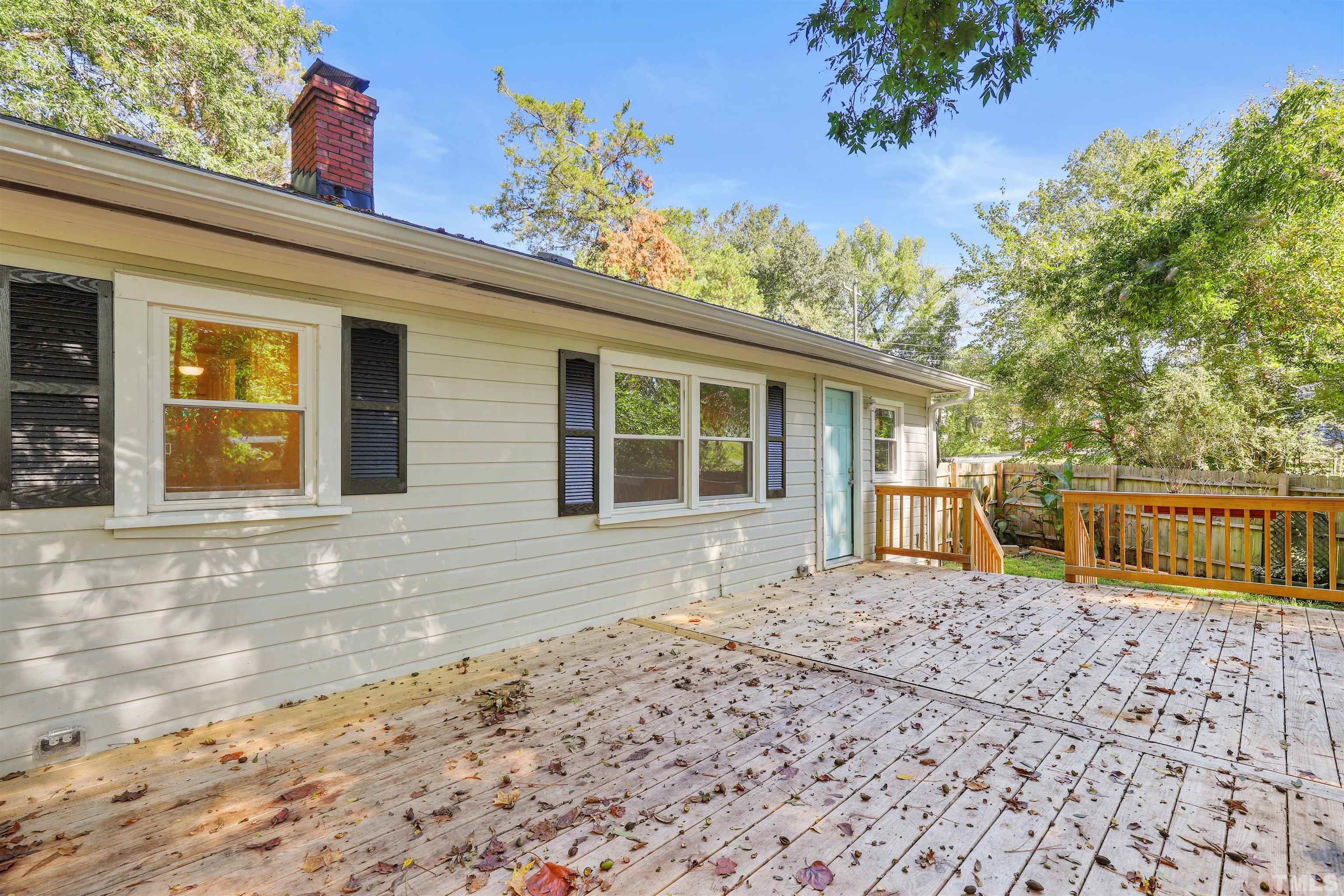 2706 Dearborn Drive Durham, NC 27704 - Photo 18 of 24 a front view of a house with a yard