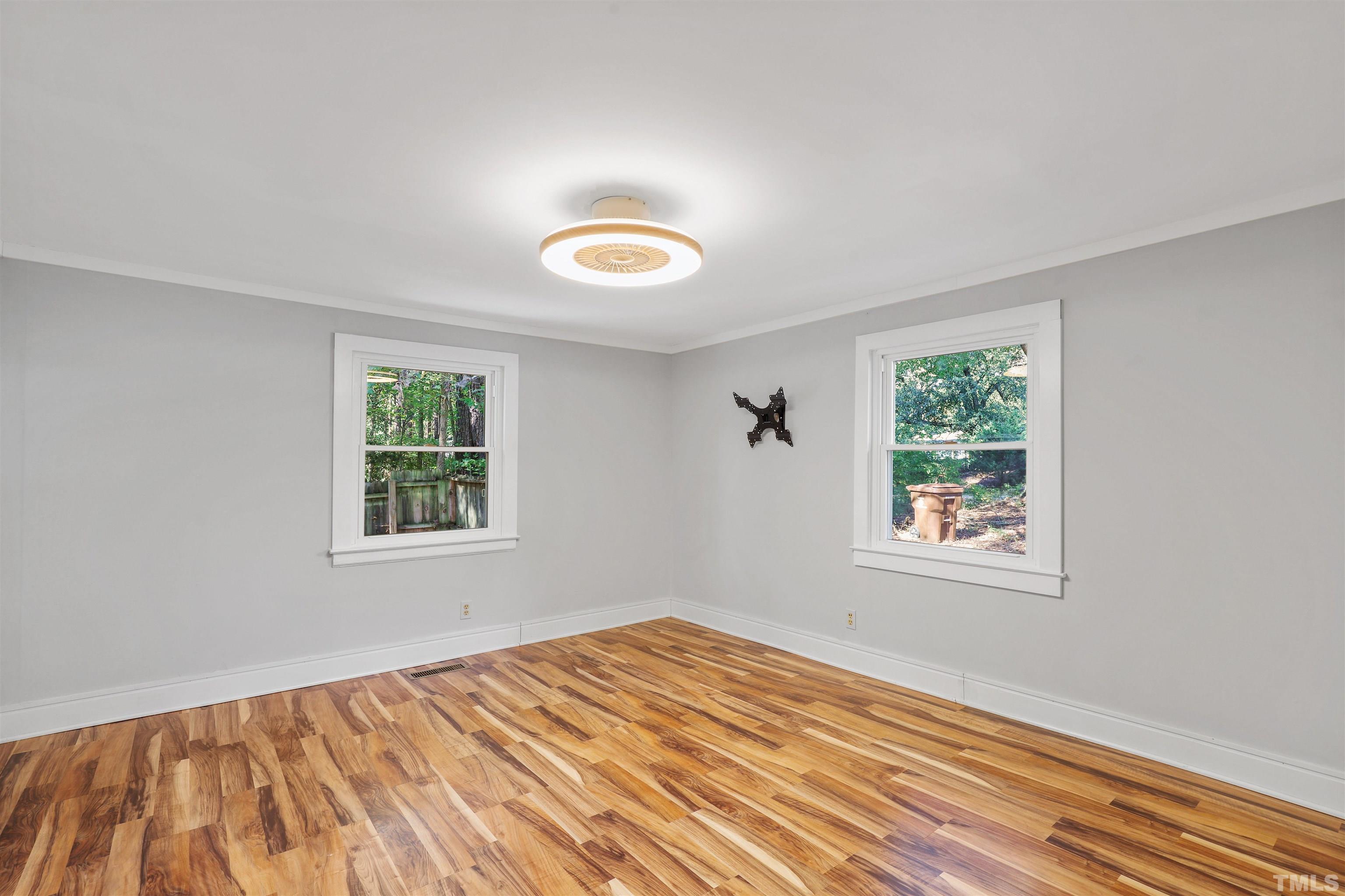 2706 Dearborn Drive Durham, NC 27704 - Photo 10 of 24 a view of an empty room with a window