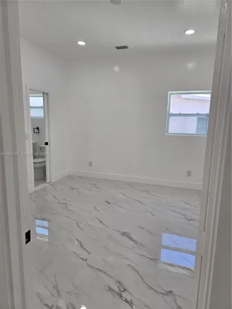 a bathroom with a toilet and a sink