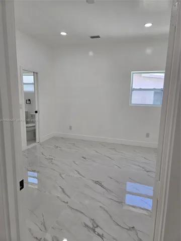 a bathroom with a toilet and a sink
