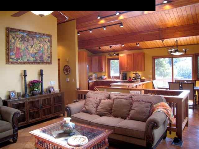 980 East Kuiaha Road Haiku, HI 96708 - Photo 3 of 25 a living room with furniture and a large window